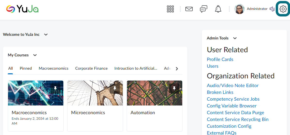 A view of the D2L Brightspace home page highlighting the Settings icon in the top navigation bar.