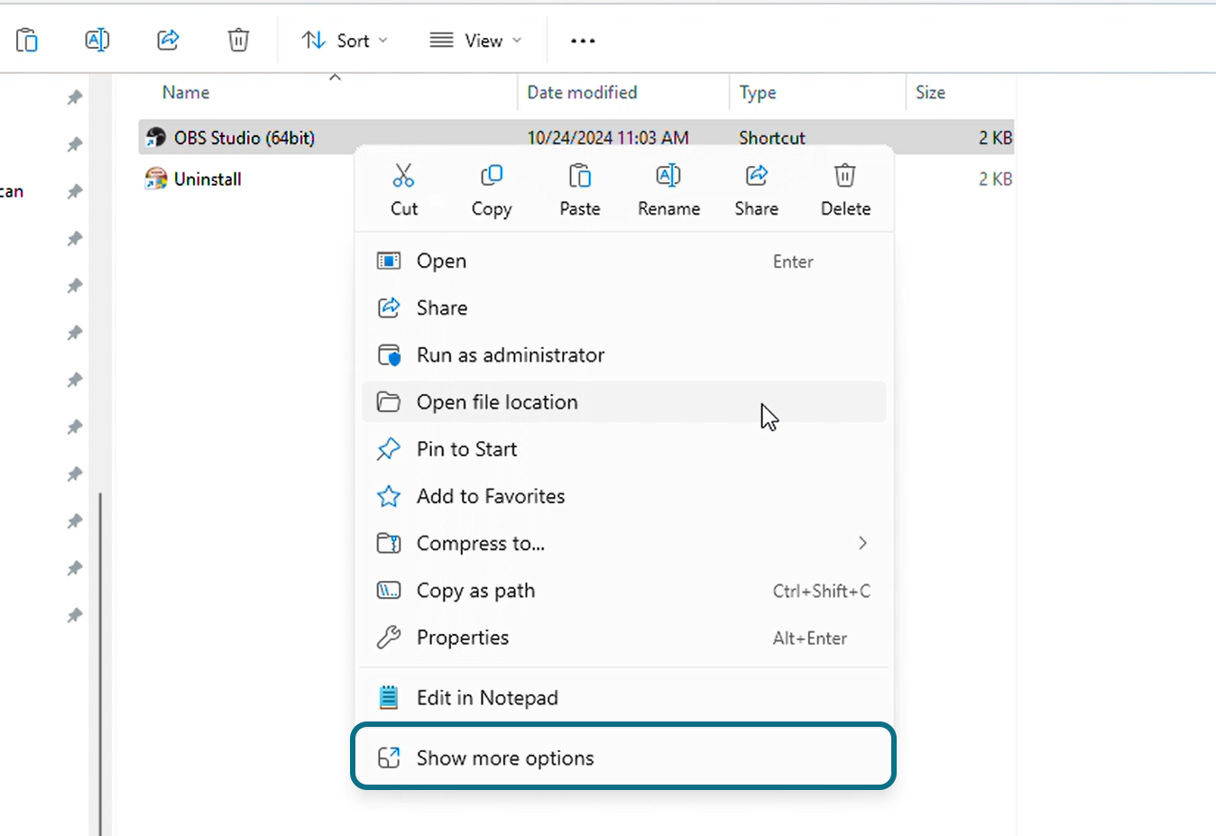 The Show more options button in the File Explorer.
